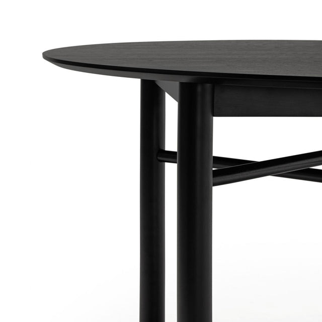 Vista detalle Mesa de Comedor Redonda Junco ø 120 cm lacada negro  estructura patas macizas madera Teulat Slowdeco